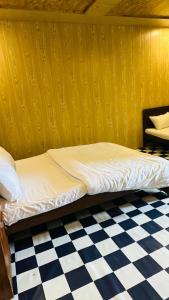 Ένα ή περισσότερα κρεβάτια σε δωμάτιο στο Fogland Guest House