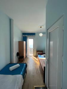 Letto o letti in una camera di Tsisa House