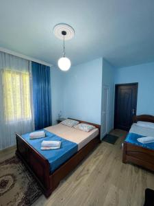 Letto o letti in una camera di Tsisa House