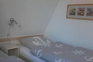 Ένα ή περισσότερα κρεβάτια σε δωμάτιο στο Am Ringwall 11