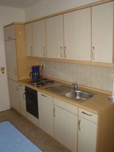 Kuchyň nebo kuchyňský kout v ubytování Am grooten Steen 20, Ferienwohnung 1