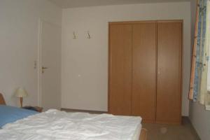 Postel nebo postele na pokoji v ubytování Am grooten Steen 20, Ferienwohnung 1
