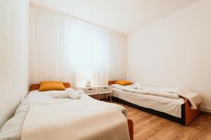 Giường trong phòng chung tại Rekreačné stredisko Bojnice - Nad Zámkom