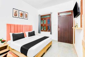Ένα ή περισσότερα κρεβάτια σε δωμάτιο στο [Day Stay - 8 AM to 8 PM] Collection O Sector 12 Bhiwadi