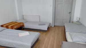 Posteľ alebo postele v izbe v ubytovaní Hostel Staromiejski