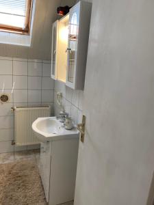 Koupelna v ubytování Friends Villa Apartments + 71 fotografií