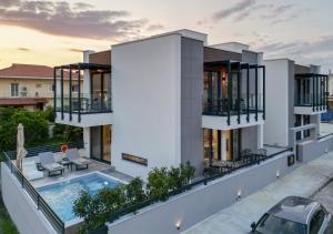 an image of a house with a swimming pool at PREVEZA VILLA center in Preveza
