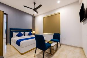 Voodi või voodid majutusasutuse Amaze Stays Noida Sector 70 toas