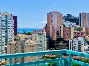a view of a city from a balcony at T252 - Atrium Beach 2 - 2004 Finestrat in Cala de Finestrat