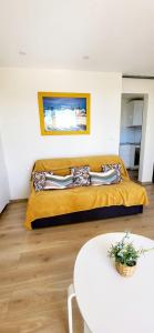 En eller flere senge i et værelse på Bambou Beach 2 à 50m de la Plage