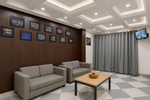Posezení v ubytování Hotel Down Town - Noida Sector 15