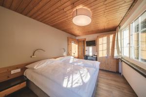 Postel nebo postele na pokoji v ubytování Hotel Quellenhof - Self Check-in & Adults Only