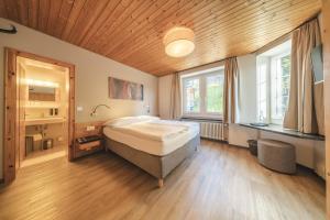 Postel nebo postele na pokoji v ubytování Hotel Quellenhof - Self Check-in & Adults Only