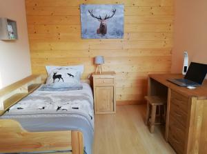 Postel nebo postele na pokoji v ubytování Gîte La Clé Des Champs