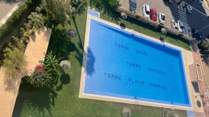 an overhead view of a large billboard in a yard at Sky&Beach Apartments in Aguadulce
