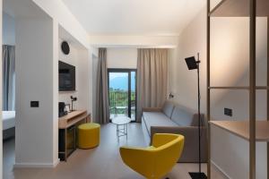 TV a/nebo společenská místnost v ubytování Hotel Royal Village