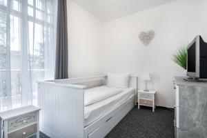 Μια τηλεόραση ή/και κέντρο ψυχαγωγίας στο Fewo Rosenhof TW 113