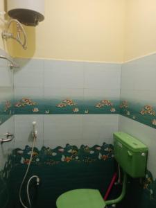 Ένα μπάνιο στο Chendura Home Stay