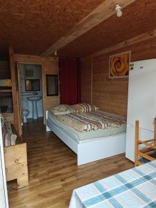Кровать или кровати в номере Agroturystyka u Edwarda
