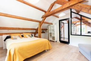 Postel nebo postele na pokoji v ubytování Gîte L'authentik