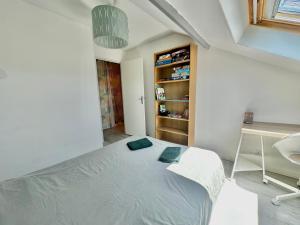 Posteľ alebo postele v izbe v ubytovaní Capucine, duplex à 5 min plage
