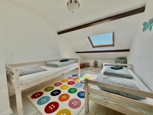 Posteľ alebo postele v izbe v ubytovaní Capucine, duplex à 5 min plage