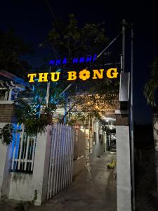 a lit up sign that says twbuong on a building at Nhà nghỉ Thu Bông - Thu Bong motel in Cam Lâm