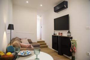 Μια τηλεόραση ή/και κέντρο ψυχαγωγίας στο Apartments Dare & Piccolo