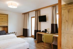 TV a/nebo společenská místnost v ubytování Hotel Thurnerhof