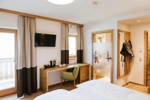 Posteľ alebo postele v izbe v ubytovaní Hotel Thurnerhof + 37 fotografií