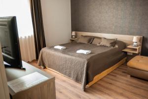 Posteľ alebo postele v izbe v ubytovaní Club MenDan Aparthotel