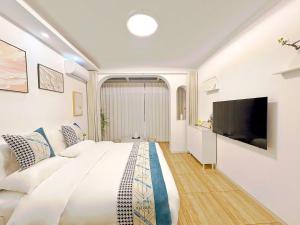 TV i/ili multimedijalni sistem u objektu Beijing Great Wall Shiguang Homestay