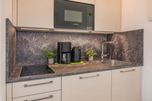 O bucătărie sau chicinetă la Villa Carmen Seebrücke