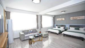 Krevet ili kreveti u jedinici u okviru objekta Beijing Great Wall Shiguang Homestay