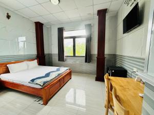 TV in/ali zabaviščno središče v nastanitvi Hotel Sen Việt Bạc Liêu