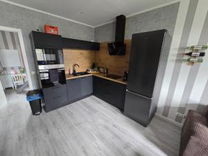 Kuchyň nebo kuchyňský kout v ubytování Havel Suites