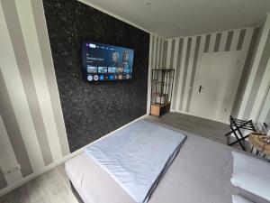 Postel nebo postele na pokoji v ubytování Havel Suites