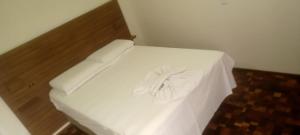 Postel nebo postele na pokoji v ubytování Hotel Flórida