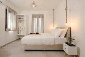 Ένα ή περισσότερα κρεβάτια σε δωμάτιο στο Naxos Balcony Apartments