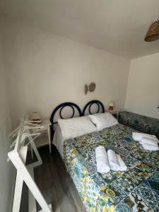 Postel nebo postele na pokoji v ubytování Casa Belvedere del Core