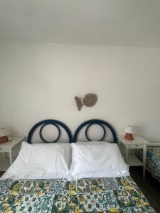 Postel nebo postele na pokoji v ubytování Casa Belvedere del Core