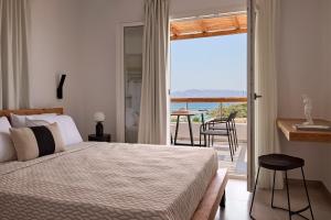 Ένα ή περισσότερα κρεβάτια σε δωμάτιο στο Eleni House +58 φωτογραφίες
