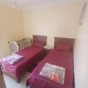 Postel nebo postele na pokoji v ubytování Evasion Bleue Anza Aagadir + 29 fotografií