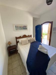 Postel nebo postele na pokoji v ubytování Pousada Brisamar Paraty COMECE O DIA COM UM CAFÉ DA MANHÃ INESQUECÍVEL
