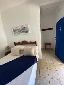 Postel nebo postele na pokoji v ubytování Pousada Brisamar Paraty COMECE O DIA COM UM CAFÉ DA MANHÃ INESQUECÍVEL