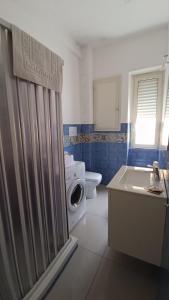 Ένα μπάνιο στο Beach Apartments & Rooms