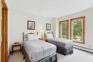Ένα ή περισσότερα κρεβάτια σε δωμάτιο στο Jay Peak Townhouse