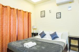 Pool Villa Near Jomtien Beach on Thep Prasit Road房間的床