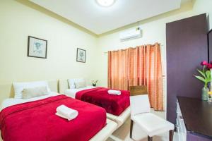 Pool Villa Near Jomtien Beach on Thep Prasit Road房間的床