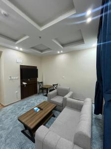 Χώρος καθιστικού στο Quel Serviced Units